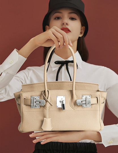Pebbled Leather Horizontal Lock Handbag