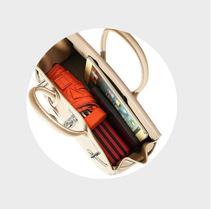 Pebbled Leather Horizontal Lock Handbag