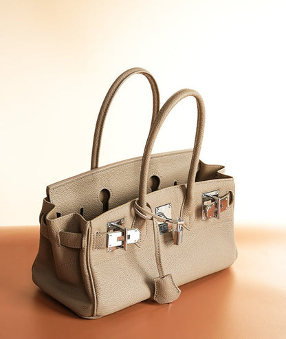 Pebbled Leather Horizontal Lock Handbag