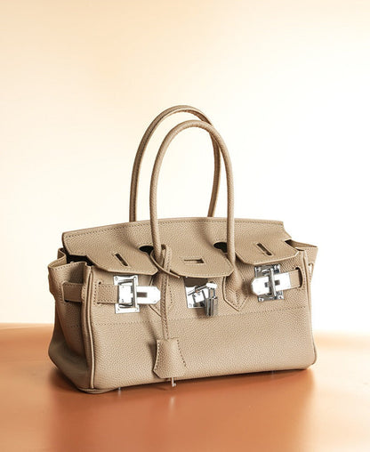 Pebbled Leather Horizontal Lock Handbag