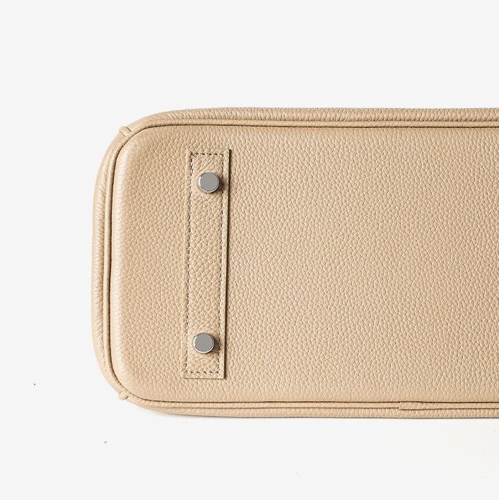 Pebbled Leather Horizontal Lock Handbag