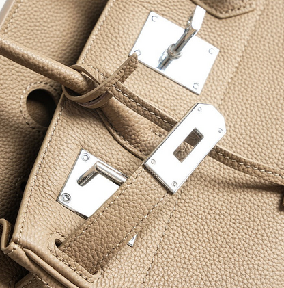 Pebbled Leather Horizontal Lock Handbag