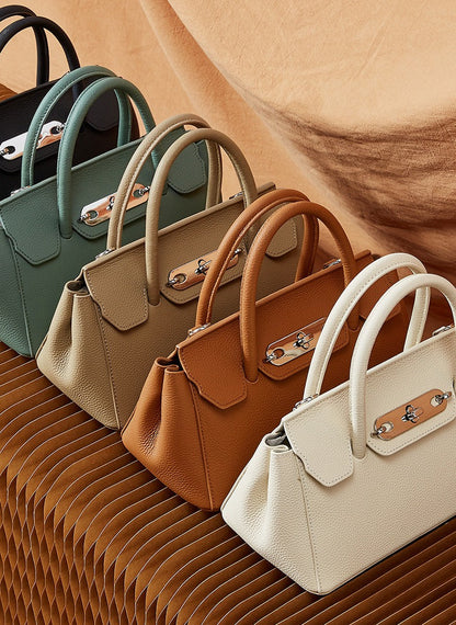 Textured Leather Twist Lock Handbag